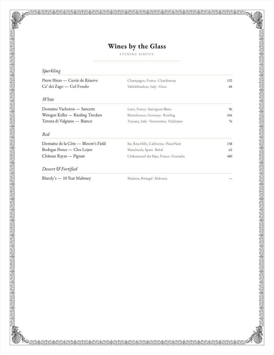 A by-the-glass list in the Bistro style, framed by an engraved Empire palmette border